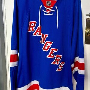 Reebok Blue Men’s V-Neck Hockey Sweater with Red & White Accents